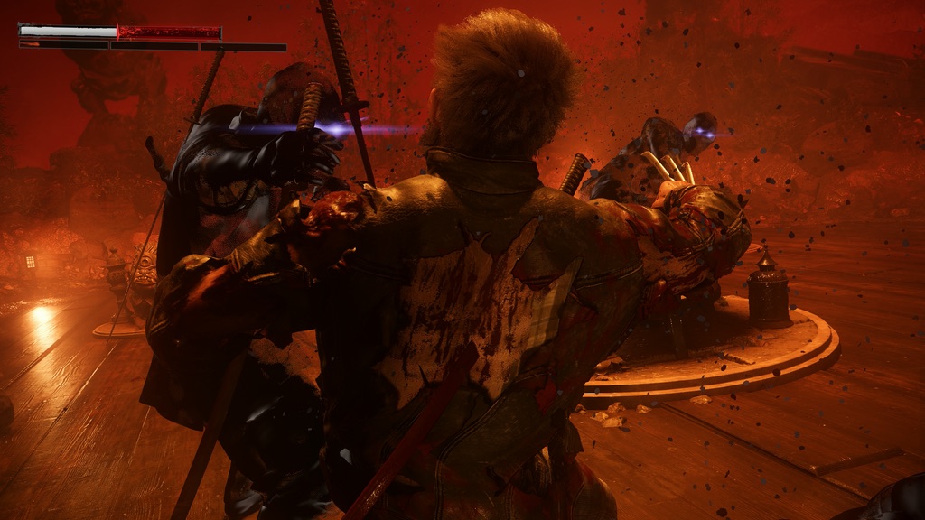 Logan is impaled by a Hand assassin during the red-tinted illusion battle